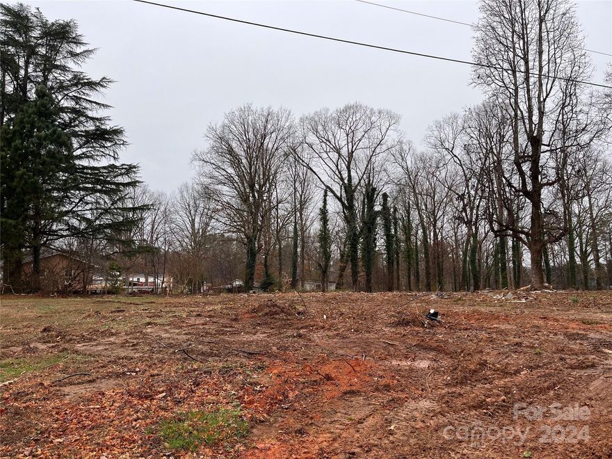 3.46 acres to work with. A 4th of the land is clear.  There is currently a duplex and a single-wide on the property with no electrical or water connection, no value is given with the asking price. Land only minutes to I-40. A 15 minutes to Hickory and within an hour of Charlotte Airport and nature's playground of Lake James.  Endless opportunities with this investment. Schedule your showing today!