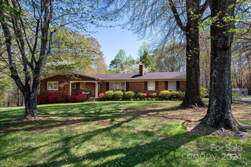 Immaculate ranch basement home in Catawba County that’s a buyer’s delight! Owner sad to say good-bye to this picture perfect property. What makes this home/location so special? Live only a 1/2 mile from LKN boat ramp, minutes to LKN State Park (hiking, biking, fishing, walking, paddle boat/canoe rentals, fishing doc). Nearby Sherrills Ford shopping/restaurants, and the 600+ acre Mountain Creek Park-pickleball, kayaking, more great hiking and biking. Welcome inside: 3 bedrms & 2 full baths, impeccable hardwood floors & new carpet in the bedrms. You’ll love the new light fixtures throughout, new interior doors, updated primary bath. Relax in the living room by the cozy fireplace w/ gas logs. Stainless steel appliances convey. Morning coffee in the sunroom overlooking the large private backyard. So much space in the unfinished basement with exterior access. New septic tank, electric water heater 2022, 2018 roof, 2024 heat pump, basement sump pump installed 2024.