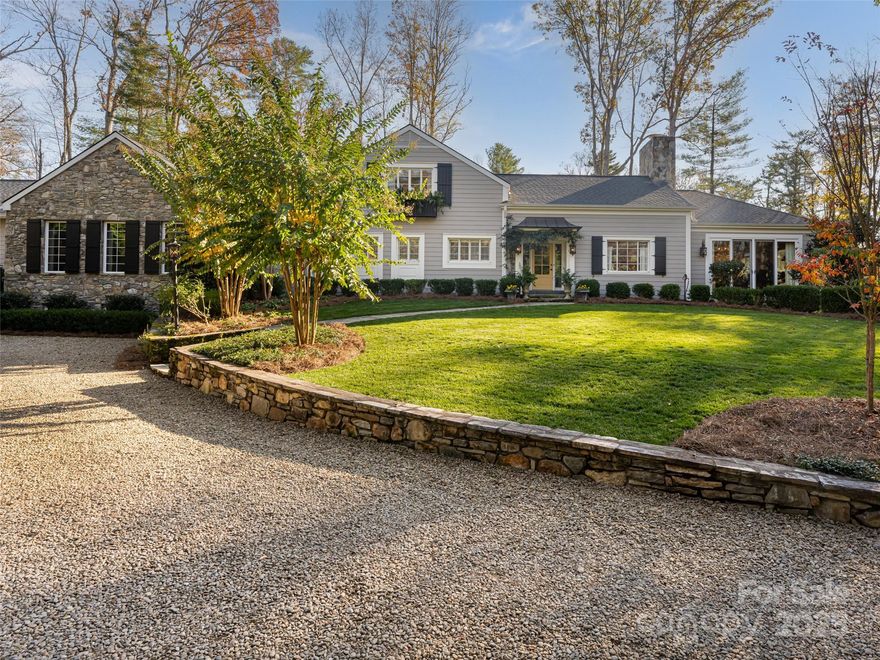 Welcome to 52 Stuyvesant Road, an exceptional Biltmore Forest home situated on 1.42 acres. The original
cottage was designed by acclaimed architect Henry Gaines. Current owners have made multiple additions
throughout their ownership enhancing all aspects of the design. Home has multiple areas for entertaining
including a large family room, den, living room/dining room, & an enclosed loggia. The custom
laundry, mud & flower room is a dream with custom woodwork and so much charm! There are 4 bedrooms with
ensuite baths & 2 additional half baths. The secluded primary suite includes a luxurious bathroom
and dressing rooms with incredible closets. On the lower level, there is a multipurpose room that is
currently an exercise studio. Outside, the rear yard offers a covered patio with fireplace for
entertaining or relaxing. Mature landscaping throughout this property offers a beautiful palette of
colors throughout the year. This type of home is very rare to find in Biltmore Forest.