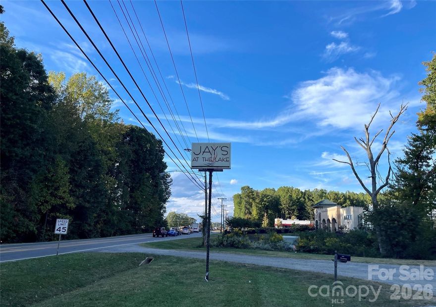 Prime commercial real estate across from new Atrium Hospital in Cornelius. 3.88 acres of land 
divided and recorded in 2 parcels, Lots #6 and #7. Zoned Highway Commercial (HC) New I-77 
exit will give access to highway #21. There's a multitude of possibilities for developers. Owner 
may finance with acceptable offer. ANY and ALL offers require non-refundable due diligence fee.
***PLEASE do not walk property without listing agent***
