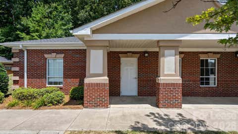 Photo of 9719 Northeast Parkway #100, Matthews, NC 28105 (MLS # 4408880)