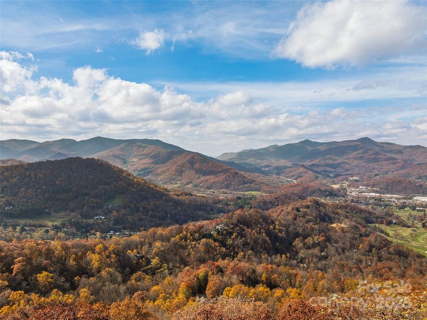 Discover a rare opportunity to build your dream mountain estate on this expansive 3.447-acre homesite nestled at over 4,000 feet in the prestigious gated community of Smoky Mountain Sanctuary. With breathtaking, year-round, long-range mountain views, this lot offers the perfect combination of privacy, luxury, and natural splendor.

Positioned near the top of the neighborhood, the terrain provides multiple potential build sites to maximize the panoramic vistas. Enjoy premium community amenities including a clubhouse, tennis/pickleball courts, and basketball court—a perfect blend of recreation and relaxation.

Ideally located just 6 minutes to the Waynesville Inn & Golf Club and 10 minutes to downtown Waynesville, you'll have easy access to dining, shopping, and cultural experiences. Plus, the Great Smoky Mountains National Park, Blue Ridge Parkway, and endless outdoor adventures are right at your doorstep.

This is more than a lot—it’s your canvas for a mountain masterpiece.