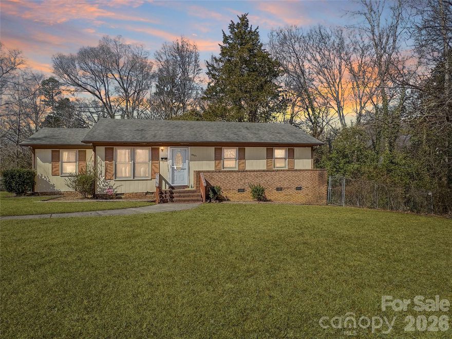 Move-in ready and ideally located in the heart of Charlotte’s highly sought-after Hampshire Hills neighborhood, this beautifully updated 3-bedroom, 2-bath ranch sits just one block from the scenic Devonshire Park and offers a rare blend of comfort, convenience, and long-term value. Tucked into a quiet, walkable area served by top-rated schools, the home features fully renovated bathrooms, gorgeous new LVP flooring throughout, a brand-new HVAC system, and a roof just 10 years old. The backyard is absolutely HUGE—perfect for entertaining, play, or future expansion. Ideally situated only 4 miles from the Eastland Yards project and NoDa, and 5 miles from Plaza Midwood, this home delivers the perfect mix of lifestyle, appreciation, and accessibility in one of Charlotte’s fastest-growing areas.