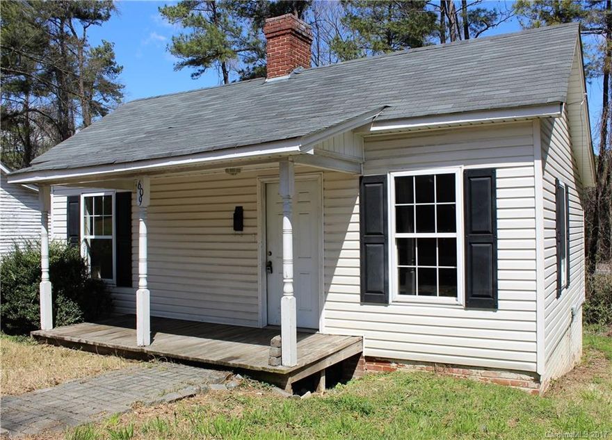 Home is being sold "AS IS" Hardwood floors. Tile. AC unit installed in 2014.