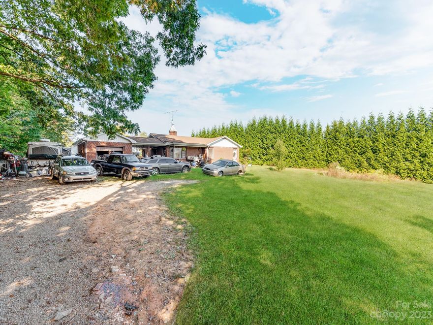 Perfect for investors or those looking to renovate, full-brick house with convenient garage.
