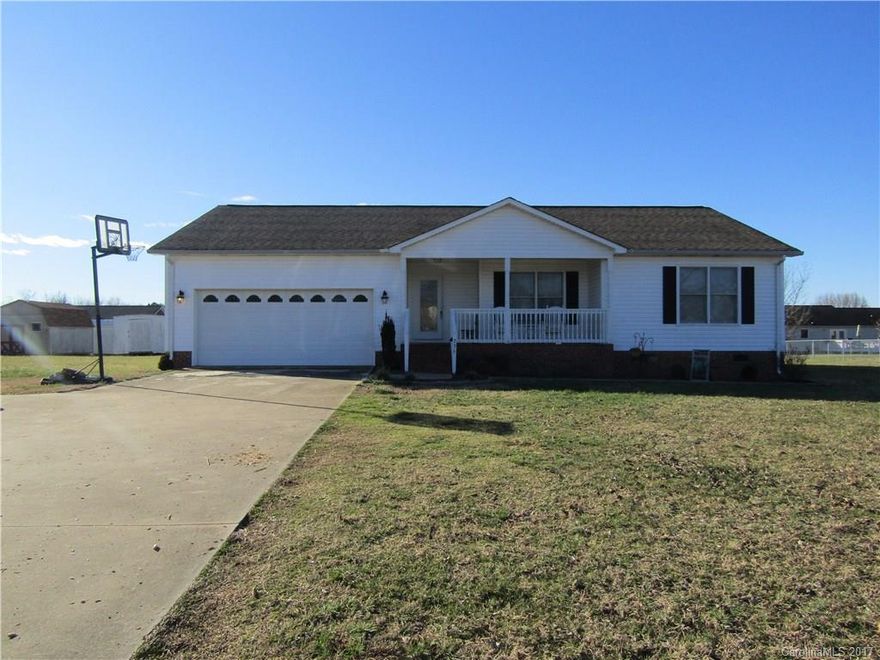 This Well Maintained 3 Bedroom ; 2 Full Bath House is ideal for that first time buyer. The Laundry Closet is located adjacent to the Kitchen Area;  There is a Spacious Dining / Living  Room area.  The Bedrooms are conveniently located adjacent to the Bathrooms. There is a Covered "Rocking Chair" Front Porch with a 12 x 14 sq. ft. Deck in the rear of the House. There is a 10 x 12  Utility Shed in the Back Yard. The House is situated on a .51 Acre Lot.