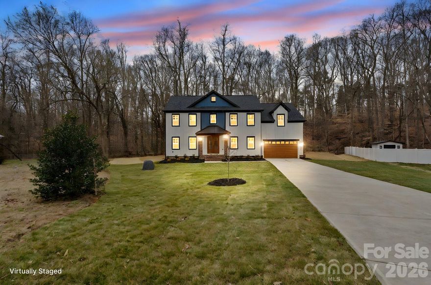 Welcome to your private dream home—where space, style, and versatility come together on over .83 acres with no HOA! This home offers the best of both worlds: the luxury and peace of mind of new construction with the freedom of a spacious place. The first floor is well-appointed with a Mahogany front door equipped with smart Wi-Fi access, a dedicated office, and a guest suite featuring a private bath. The kitchen includes an amazing smart 5-burner electric range with Wi-Fi and Bluetooth connectivity, while the modern electric fireplace also features smart controls. Additionally, the property is ready for the future with a dedicated electric vehicle charging connection.
Upstairs, you will find comfortable bedrooms that include walk-in closets, vanities and custom glass showers. Outside, the backyard features a porch and a pergola surrounded by beautiful trees and a small creek, creating a wonderful setting for making unforgettable moments with family and friends.