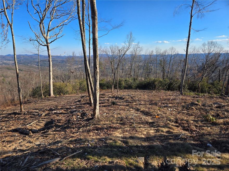 $15,000 buyer credit at closing for this spectacular mountain top lot. Light will dance from sunrise to sunset with the expansive SE & SW exposure. At nearly 3500' elevation, this lot sits on Sprout's ridge and offers a gently sloping build site to a nearly flat back yard area. Your dream home site has a 5 BR septic permit in place. 
Sprout offers community gardens and miles of hiking and mountain biking trails on 150 acres of conservation land. Forever preserved for the exclusive use of Sprout owners. Encouraging the use of green building practices such as solar panels and geothermal systems Sprout Mountain is a forward thinking development.