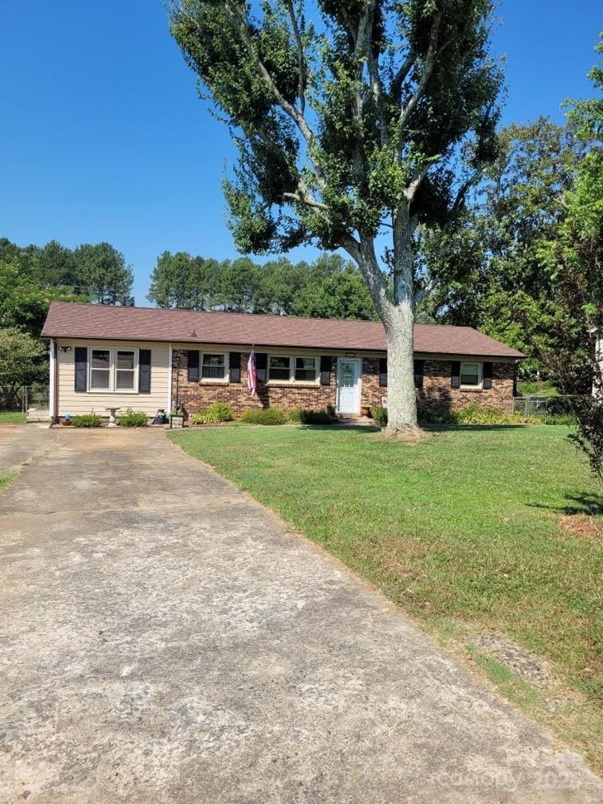 Adorable 3 bedroom, 1.5 bath with a backyard oasis in the Oakley Park community! Neat and well maintained home featuring "his and hers" sheds! "His" shed is a wired workshop. Enjoy the large covered back deck with a 14 ft. above ground sparkling pool including pool pump and accessories, ready for these hot summer days! Beautifully fenced yard with mature landscaping including roses and fruit trees. Inside the living room features a gas fireplace and the family room an entertainment center with mounted tv included for movie nights. A cook's kitchen with a gas range. Easy to maintain vinyl plank flooring and ceiling fans throughout. The spacious bonus room could also be used as a 4th bedroom. Utility room includes a built-in pantry and washer and dryer. Tankless water heater.