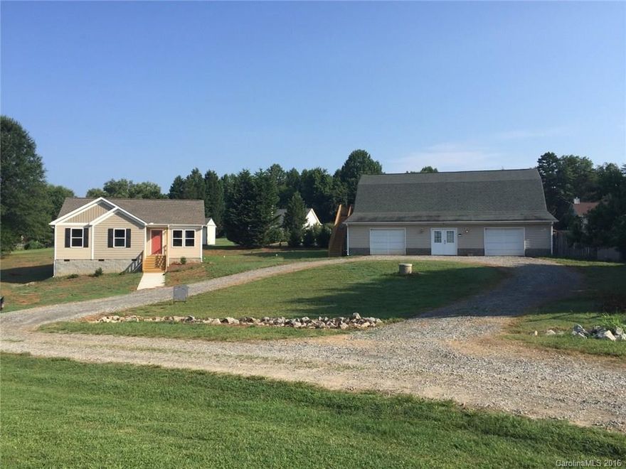 Brand new! Cute ranch in quiet neighborhood with detached garage/workshop. Modern open floorplan with Granite countertops and engineered hardwoods. Soaring ceilings in Master. 4+ Car Garage is 46x50 and has 800 heated sqft and 2 bonus rooms with full bath above. Perfect for your man cave. Shop is insulated and heated with 12' ceilings. Industrial air compressor, 200 amp service, oil changing pit, double utility sinks. Garage has 3- 10'x10' doors and 2- 9'x7'. All doors are insulated.