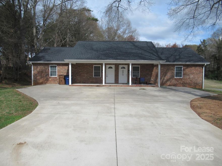 Check out this charming all-brick duplex conveniently located near Downtown Lincolnton! With nearly 1,000 square feet, this home features a spacious den, a modern kitchen with granite countertops and all appliances, and vinyl plank flooring throughout. The two good-sized bedrooms share a full bath, and the unit includes ceiling fans, a laundry area with a washer and dryer, and a covered front porch with a rear patio. Located within walking distance to downtown and a short walk to the Rail Trail, this home offers both convenience and comfort. An application is required to be considered for lease, and small-breed pets are allowed.