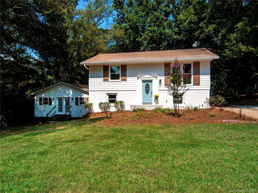 Beautifully updated home situated on over 1/2 acre in the heart of Fort Mill!  New interior & exterior paint, new flooring, new soft closing shaker cabinets w granite, tile backsplash, new stainless appliances including self-cleaning/convection oven.  Includes 750 sqft of FINISHED detached space - use as an office, workshop, media room, craft room, man cave… so many possibilities!!!  Great Fort Mill schools!  Qualifies for 100% USDA financing! No HOA!