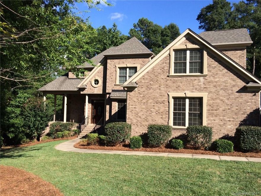 Great buy on this almost 4500 SF home on over 1 acre! Seasonal waterview of beautiful Lake Wylie! 2 large bonus rooms upstairs-could be 5th/6th bedrooms if needed. Garage doors are higher then normal-can store a boat. 2 water heaters. Butler’s Pantry to formal dining room. Hardwood flrs on main level. Screen porch & large deck. Huge fenced backyard. Walk-in crawl space. 1st flr master suite. Central vac. Gorgeous gourmet kitchen! Covered side porch off great room.