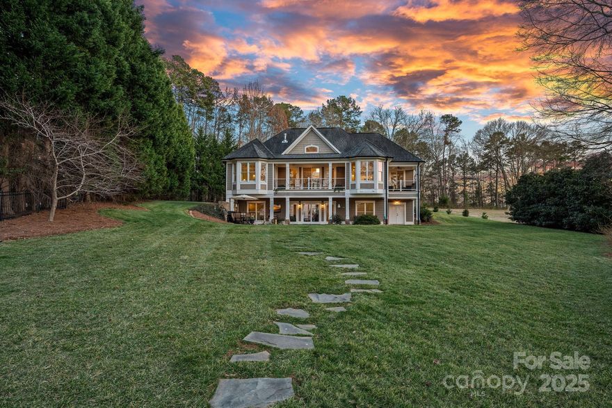 This custom built home with 119 ft. of shoreline provides the ultimate waterfront & outdoor living experience. Located on a private cove in Huntersville, inside you'll discover an open, beautiful, & bright interior.  A newly renovated kitchen with SS appliances, large island, 4-burner cooktop, & walk in pantry is open to the dining area and living room with a stunning stone gas fireplace. Enjoy morning coffee under the covered balcony accessed via the kitchen or flex space. The primary suite on the main level features lake views & a private entrance to a covered balcony. Multiple patios offer peaceful lake views and accentuate outdoor living. The walkout basement has two bedrooms, two full baths and a large living area with wet bar, ideal for entertaining.  A quiet cove for swimming, paddle boarding, kayaking, and year round boating access opens up to expansive views. Ideal Lake Norman location with easy access to Birkdale, Uptown Charlotte, and Charlotte Douglas Airport.