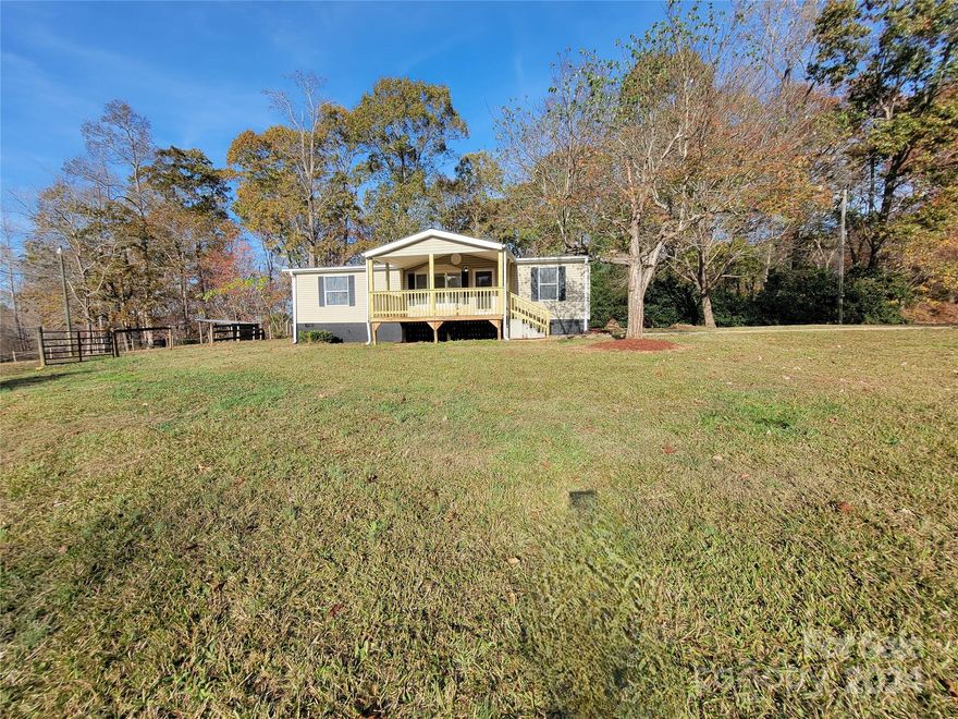 Stunning 3 bedroom 2 bath home. Quiet Country setting. Plenty of land and stable for your animals, Horses. Fresh Paint throughout the home. New flooring. New rear deck. Covered front porch to see and relax and watch the sunset. Renovated kitchen. Sits on 4.96 acres