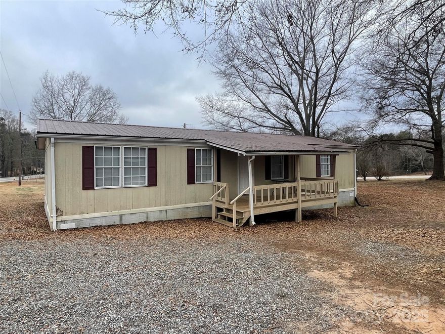 Move in ready home on a .66 acre corner lot just outside Ellenboro City limits. This 1994 Horton Mobile home features an open floor and split bedroom plan with a large primary bedroom and bathroom. The Title to the home has been cancelled with the DMV and it is registered as Real Property. The home also sits on a permanent foundation which meets FHA requirements. Some of the updates the new owners have made are adding a bigger back deck and replacing the heat pump in 2021. Home is on public water and has a septic system.  Schedule your showing to see this property today. It won't last long!