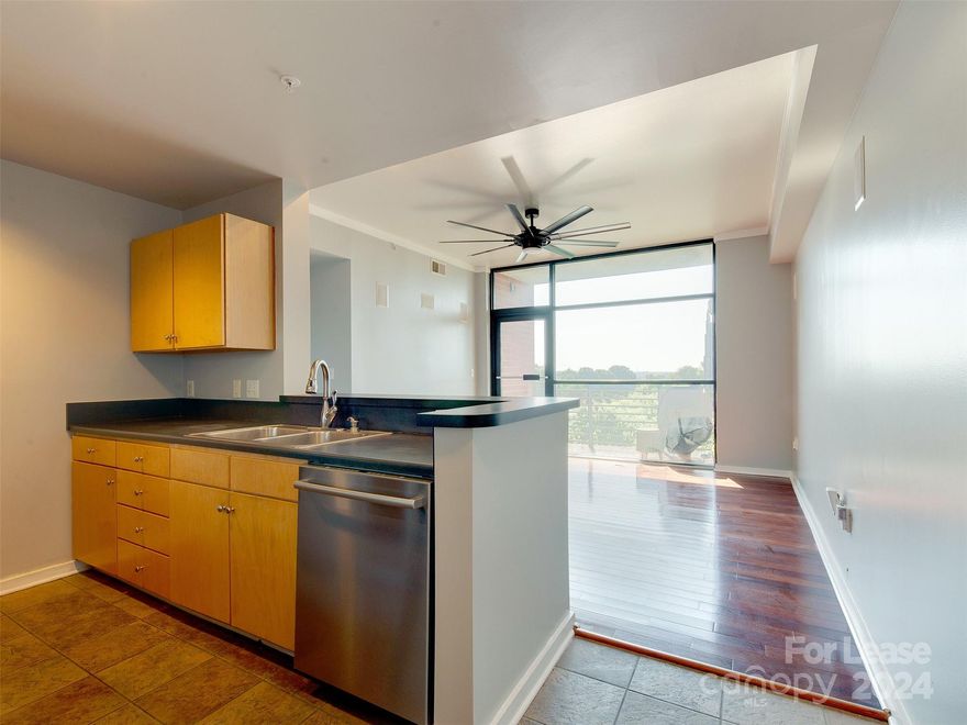 Half off one month's rent! This move in ready condo has it all in Charlotte's historic 4th ward neighborhood.  The neighborhood is known for its great parks, restaurants and ease of access to get anywhere in Charlotte.  The community features an outdoor pool and secure parking deck.  As you arrive on the 6th floor, you are just a few steps away from the front door and all the bright light it receives. The kitchen features stainless steel appliances, a gas range and dishwasher overlooking the living room.  There you will find surround sound and a wall of windows overlooking Charlotte!  The primary bedroom is on the corner and gets light through the plantation style shutters.  The en suite bath is roomy and comes with the shower/tub combo.  The second bedroom isn't very large but makes a great guest suite, home office or storage space.  The 2nd full bath is great for guests or when entertaining!  Check out the roof top patio and be just seconds from all the action in Uptown Charlotte!