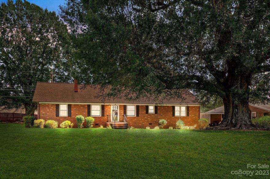 Custom built, one owner, brick ranch offered in the heart of Mooresville! Positioned on a large .546 acre lot featuring 2011 square feet with 3BR-2BA, cozy front living room with fireplace & built ins, dining room, spacious laundry room with sink and cabinets, study/office, and large den with built-ins. Kitchen features an updated stainless steel wall oven, electric cooktop with hood vent and a stainless steel refrigerator. You can't beat this location-call today to see this beauty for yourself!