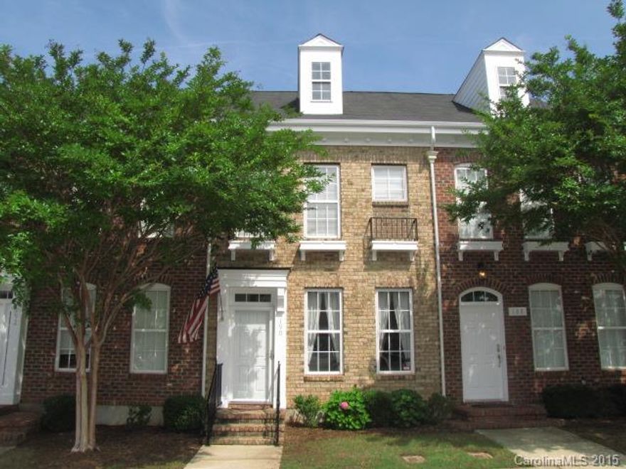 This beautiful brick town home has lots of charm! The 2-bedroom, 2.5-bath floor plan is light and airy, including a living area with a fireplace open to a dining area with wainscoting, as well as the kitchen with a breakfast bar and gas cooking. The first floor features gorgeous crown molding throughout. The rear enclosed courtyard with a patio leads to the detached 2-car garage. Walk to shopping, dining and more!