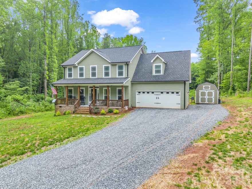 Welcome to your own private oasis! This stunning 2,541 sf home, built in 2024, sits on a beautiful 1+ acre lot offering peace and privacy but modern comfort with no city taxes.  This property offers the best of both worlds. It is tucked away from the hustle and bustle but still conveniently located close to schools, shopping and dining. Enjoy spacious, open floor plan, contemporary finishes with granite and quartz countertops in kitchen, farmhouse sink, double oven, self closing cabinets, large pantry & laundry room, gas fireplace in family room, LVP in downstairs main areas, hardwood flooring on stairs, carpet in the bedrooms, large primary bedroom, private water closet in bathroom along with dual sinks, a bricked primary shower, soaking tub and two large walk-in primary closets. Step outside and enjoy the spacious 20x20 deck, perfect for entertaining guests, grilling out or simply relaxing while overlooking the peaceful surroundings. If you want luxury, convenience and seclusion, this house is for you!