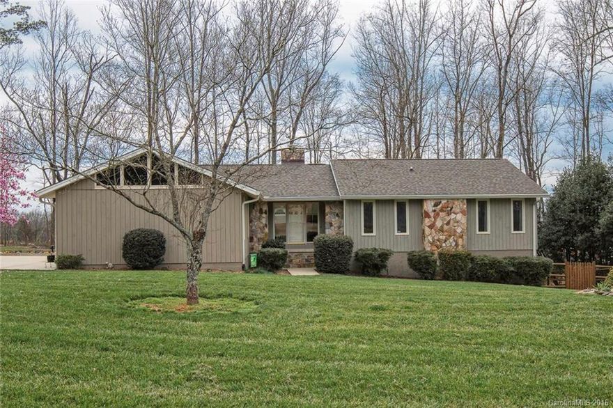 Beautiful home & setting!  Loaded with upgrades - granite, new custom cabinets, lighting, hardwood flooring, custom closet inserts, sunroom, Trex decking, screened porch, patio....much more.  Basement is finished with BR, BA, Kit and Den - could be second living quarters. Large lot, fenced, tree buffer.