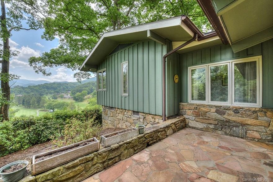 Golf Course Lover's Dream! The golf & mountain view from this location is spectacular!  Large windows along the back of the home give every room a year-round terrific view.  The master bdrm is XL.  Cathedral ceiling in the open, large great room with stone fireplace. Large Yard - part level. Decks and patio's with built-in seating wrap around the home making every side perfect for entertaining, relaxing, envisioning the next golf round.  Paved, maintained road. Club Info www.maggievalleyclub.com