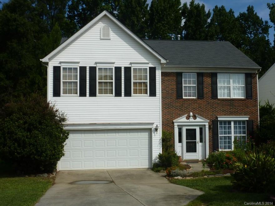 Great home with a great floor plan on a great lot backing up to woods with a fenced yard makes this very private and great for entertaining.  Kitchen, living room and sun room combined make a great first floor gathering space for family and friends!! All bedrooms, loft and laundry are all upstairs! Laminate floors throughout for easy maintenance.  Refrigerator, washer and dryer remain with the home.  1 year home warranty included.  Close to Concord Mills area as well as I-85 and UNCC!