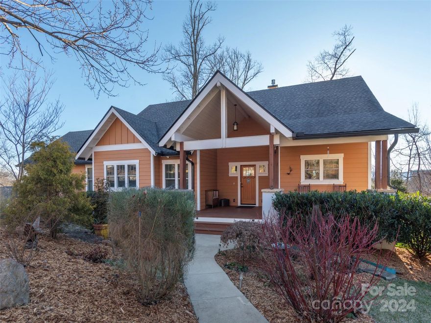 Original owners offer quality craftsmanship throughout this beautiful custom-built home. Live comfortably on the main level in the spacious primary suite including a spa-like bathroom; open floor plan with kitchen/dining area/great room for perfect entertaining space; study, full bath, walk-in pantry, laundry room, western exposure with sunset views of Biltmore Village from screened deck; over-sized double garage (pull-down floored attic). Lower level offers two additional bedrooms, full bath, rec room and more great storage. Landscaping includes mature native plantings. Close to downtown Asheville conveniences with an upscale neighborhood appeal.  Check out the video:  :https://listings.tcmphotos.com/sites/yzpkpng/unbranded