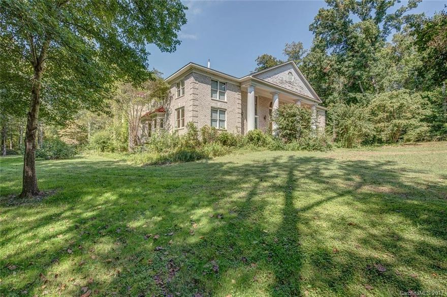 Remarkable, palatial home in need of work, but with a price that makes it a fantastic buy! The possibilities are endless: Indoor pool, upper bedrooms with space for private kitchens, spacious and private yard.