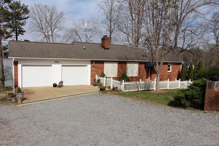 Lake front home on Lake Lookout sits on over an acre of land w/amazing lake views. The basement is heated & cooled w/ heat pump but is not finished. The basement square footage is counted in total heated square footage. This home has 2 BRs, 2 ½ BAs & a basement with a 3rd room, full bath, laundry w/ built-in’s & recreation area. The living room shares a dining area around a stone, floor-to-ceiling gas log FP. The kitchen has been updated w/ a granite top, breakfast island & SS appliances.