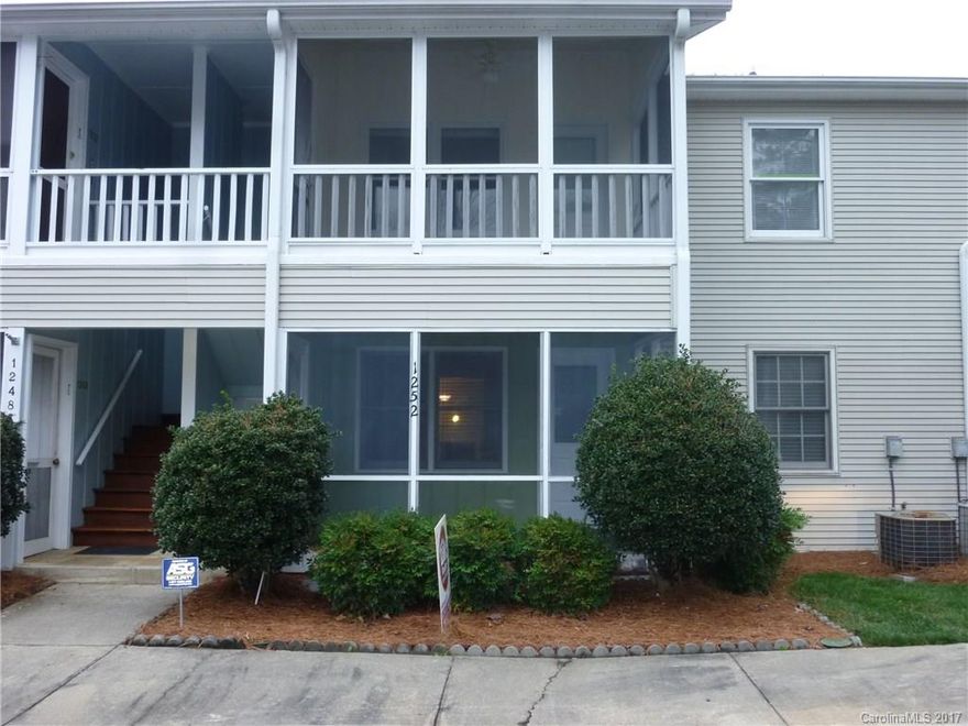 Ground level condo with 2 bedrooms, 2 baths featuring large living room with wood burning fireplace, eat in kitchen & screened porch.  Close to shopping, dining and convenient access to I-77.