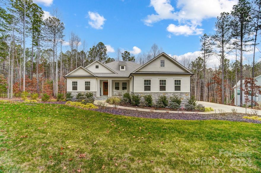 This stunning property in Harbor Oaks boasts a generous 1.44-acre wooded lot with lush landscaping and an irrigation system for hassle-free maintenance. Enjoy outdoor living with a screened-in patio and spacious deck, perfect for entertaining or restful moments surrounded by nature. Benefit from energy-efficient living with Energy Star-rated appliances, including top-of-the-line GE Café kitchen appliances. Entertain effortlessly with a plumbed bar and built-in sound system throughout the home. After a day of entertaining, unwind in the luxurious super shower in the primary bathroom. With over $100,000 in upgrades, this home epitomizes modern comfort and sophistication, offering a luxurious retreat for its fortunate occupants. Don't miss the chance to make this your dream home, perfect for hosting unforgettable gatherings and creating lasting memories with family and friends.