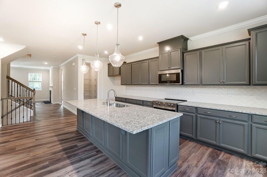 READY NOW - New Townhome in highly desired community of Summers Walk, Town of Davidson. New construction (4 BR / 3.5 BA) includes guest suite w/full bath on main level, oversized 2-car attached garage, 2nd floor covered porch, beautiful upgraded kitchen w/large island & walk-in pantry, and all the upgraded finishes included. Summers Walk offers an abundance of amenities including large swimming pool w/water feature, clubhouse, & parks-playground-greenspace. Walking trails throughout community connect to West Branch Nature Trail & 90-acre West Branch Nature Preserve bordering community. This nature trail gives the Summers Walk community direct access to the town's many greenways, nature trails, bike lanes, parks, & Downtown Davidson. Perfect way to enjoy the outdoors & all the amenities of The Town of Davidson. Up to $27,000 incentive for closing cost, prepaids, and interest rate buydown w/use of preferred lender. Contract must be entered as of 01/31/24 with home closing by 03/31/24.