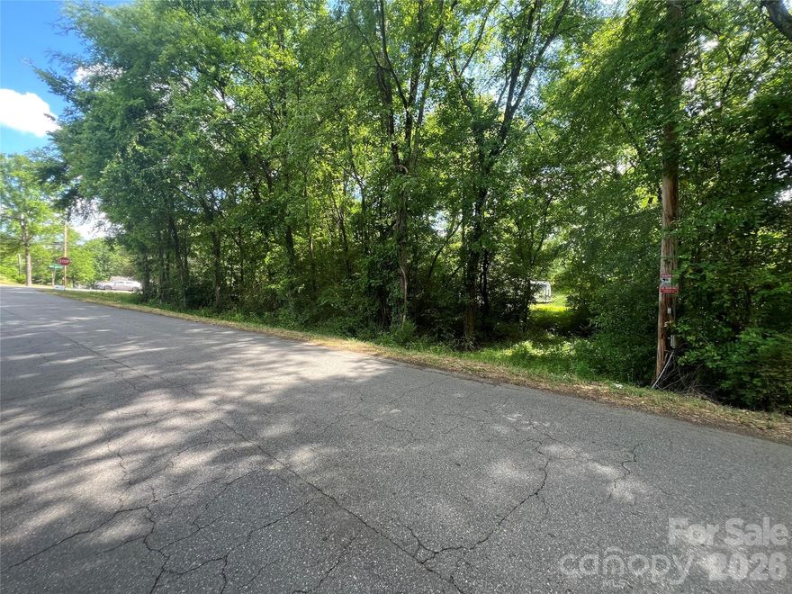 Opportunity knocks with this +/- 0.45 acer lot in Concord! Conveniently located within a half mile of Central Cabarrus High School and J.N. Fries Middle School. Zoned Residential Compact (RC), this parcel allows for a variety of residential uses subject to city approval. Utilities available with tap fee. The lot is located within a designated floodplain, and buyers should verify ability to build, floodplain regulations, and permitted uses with the City of Concord. Schedule your showing today!
