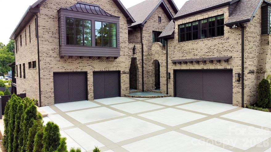 Tucked away on an expansive homesite in the coveted heart of Myers Park, this exceptional luxury new construction residence blends sophisticated design with effortless livability. Backing directly to the Greenway with convenient sidewalk access, the property offers a rare combination of tranquility and connection to the surrounding neighborhood. Thoughtfully designed for both everyday living and elevated entertaining, the chef’s kitchen opens seamlessly into the main living spaces and serves as the centerpiece of the home. A stunning cast-stone gas fireplace anchors the living room, while oversized doors lead to a covered rear porch complete with a second fireplace for year-round indoor-outdoor enjoyment. The upper level features three generously sized bedroom suites, each with walk-in closets and private baths, including a luxurious primary retreat with spa-inspired finishes. The fully finished lower level offers exceptional flexibility with an oversized recreation space opening to a covered terrace, an additional guest suite, and substantial storage. Future-ready features include plumbing for a secondary kitchen, structural support for a future elevator, and dedicated space for a custom wine cellar. Every detail has been carefully curated to create a timeless and refined home in one of Charlotte’s most sought-after locations.
