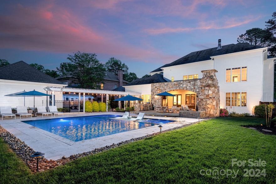 Step into the opulent world of this distinguished estate, meticulously designed to accommodate a busy lifestyle as well as relaxation and entertainment.  The outdoor oasis features a luxurious pool with swim jet, tanning ledge and spa. The gourmet kitchen boasts commercial style appliances and a chef's layout. The flexible floorplan includes a serene primary suite with a spa like bath offering a large walk in shower and duel vanities.  Outdoor entertainment awaits on the covered patio with a kitchen and outdoor masonry fireplace. This home is not only gorgeous, it includes smart features like Sonos, Wi-Fi lighting control inside and out. This residence is a blend of luxury and functionality, perfect for those seeking a sophisticated lifestyle.  Attention to detail is evident throughout, from the custom built closet to the 8 foot doors on the first floor and site finished oak hardwoods.  With so many features this house has to offer, please see the attached feature sheet.