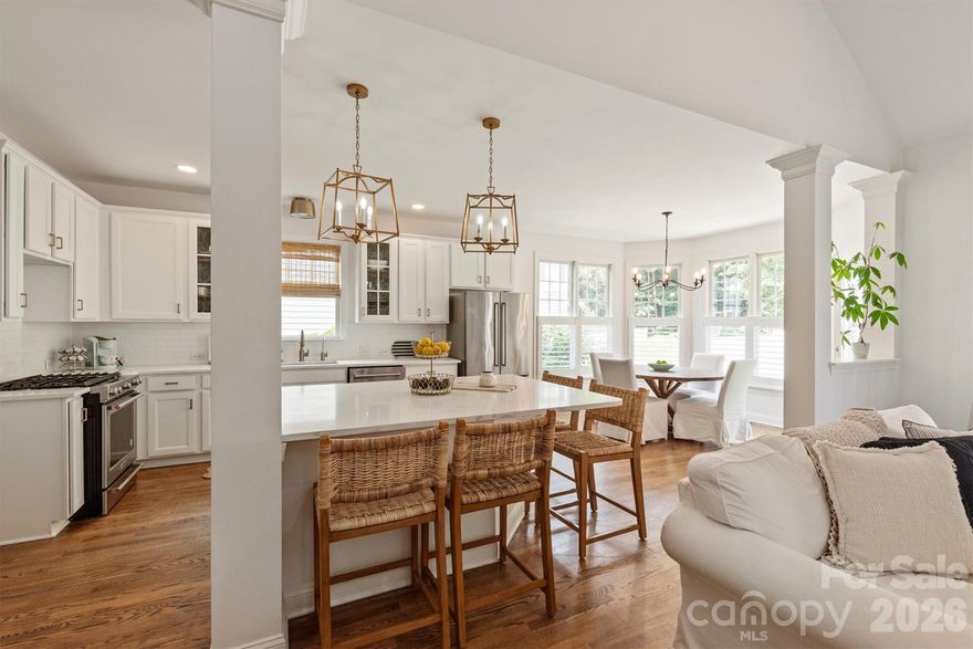 Stunning Southern charmer perfectly positioned across from a pocket park, the Baxter trail system, and situated on a large, wooded, private lot, which is a RARE find in highly sought after BAXTER VILLAGE! Renovated throughout with TIMELESS choices of Snowbound paint, white kitchen with white Quartz countertops, oversized island, gold hardware, and new lighting throughout.  Spacious and bright open floor plan with a TWO STORY family room anchoring the main living space with rich HARDWOOD FLOORS throughout the ENTIRE home adding warmth and sophistication. MAIN FLOOR owner's suite with COMPLETELY RENOVATED spa-inspired bath featuring an oversized shower, dual vanities, gold hardware, and natural wood accents throughout. Formal dining, FIFTH bedroom, and fourth FULL bath on the main floor. Enjoy the large bonus room on the second floor, three secondary bedrooms with WALK-IN closets, and two additional full baths. Whole house WATER FILTRATION SYSTEM and REVERSE OSMOSIS installed. NEW Interior/exterior paint, appliances, ductwork in the crawlspace, and secondary bathrooms.  Walkable to the Baxter Village pool, clubhouse, tennis courts, shopping/dining on Market Street, and Music in the Park. Baxter Village is not just a community, it's a lifestyle like no other in the Charlotte area!