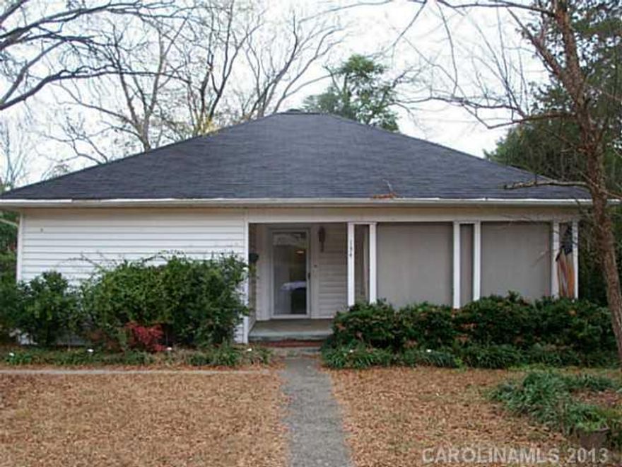 Approx 1 acre with frontage on Hillandale and Carolina! Charming fixer upper with 3 bedrooms, 1.5 baths,  large living room, dining room opens to deck, and den with fireplace. A little tlc will make this a great comfortable home! Large workshop.