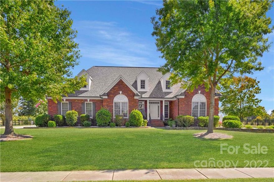 This home has it ALL!!! Amazing brick home situated on an oversized  fenced in yard in the desirable Stallings Farms neighborhood. This home has room for everyone,2 car side load garage, with an additional garage that can be used as a workshop. The outdoor space is perfect for summer days with a pool, a covered and uncovered deck! Or enjoy your relaxing mornings in the large sunroom. The upper level features a full bathroom and bedroom, casual sitting room with additional space for an office, reading nook, play room and plenty of storage!