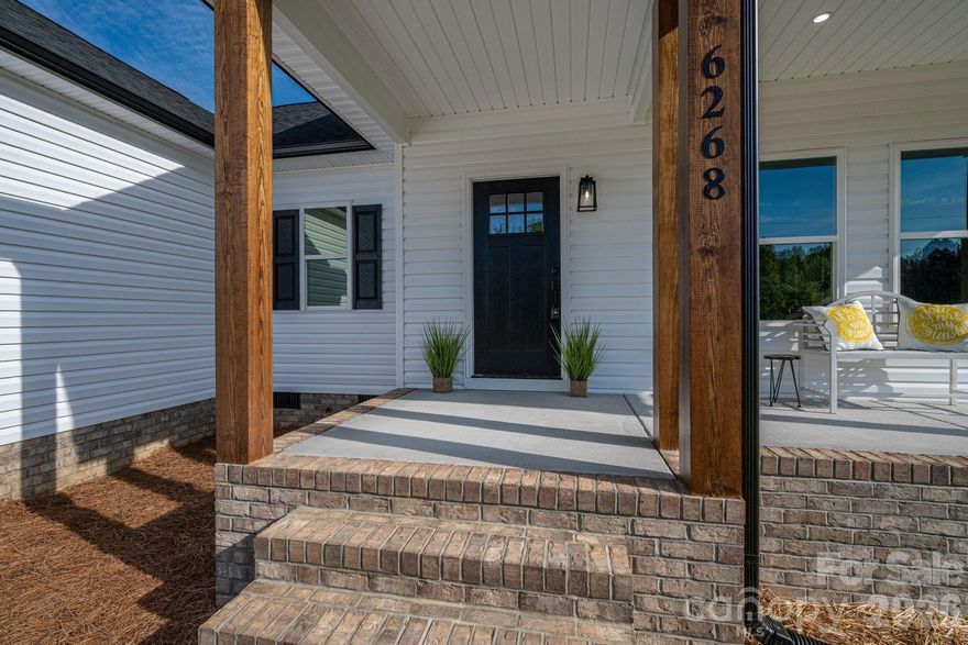 New Construction in Western Lincoln County!

Welcome to this beautifully crafted 3-bedroom, 2-bath home featuring an open, split-bedroom floor plan designed for both comfort and functionality. The inviting living area is anchored by a stunning fireplace, creating the perfect focal point for relaxing or entertaining.

The kitchen showcases elegant soft-close cabinetry, gorgeous granite countertops, and a stylish subway tile backsplash that perfectly complements the home’s modern décor. Sleek black fixtures throughout the home addsa touch of sophistication and cohesion.

The spacious primary suite offers a large walk-in closet and a luxurious en-suite bath complete with a double vanity, soaking tub, and a tiled shower featuring a rain shower head—your own private retreat.

Additional highlights include a separate laundry room and ample storage throughout the home, providing both convenience and practicality.

Coming Soon – Showings Begin April 11!
Join us for an Open House on April 11 from 10:00 AM to 12:00 PM. Stop by for refreshments and see firsthand what could be your next home!