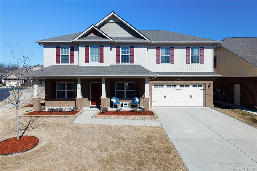 Gorgeous home on corner lot in Kingsbridge. Excellent Condition w/granite counter tops, hardwoods, and walk in closets. Open floor plan w/gas log fireplace creates a cozy ambiance! Huge 2nd floor Master Bedroom w/separate sitting room w/4 lg bedrooms. Custom built stone fire pit perfect for entertaining and cookouts! New hardwood floor in family room. Comes with one Year Home Warranty. Agent is seller. Minutes from I-77/485, Carowinds, Lake Wylie, RiverGate and Premium Outlets shopping & dining.