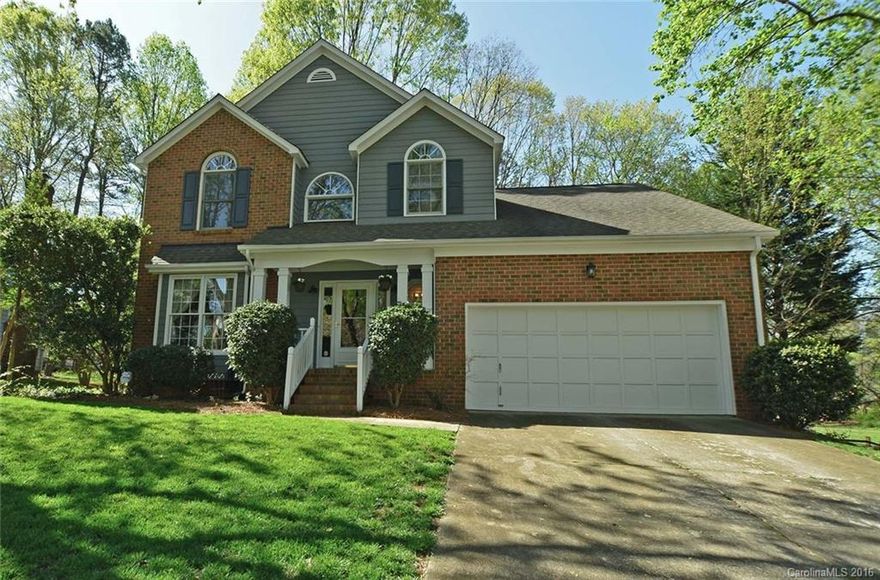 Conveniently located between I77 & 85 and shopping.  Recently updated with granite, stainless, gas range, tile back splash, recent interior and exterior paint.  Great room features gas log fireplace, fan, speakers and is open to kitchen/breakfast room.   Home is hard wired for internet and also features Cat 5e/6.  Pull down attic stairs, Dual HVAC, whirlpool, smooth ceilings. deck overlooks wooded, fenced lot.  Wood floors in Living, dining and foyer.  Google fiber being installed in Davis Lake.