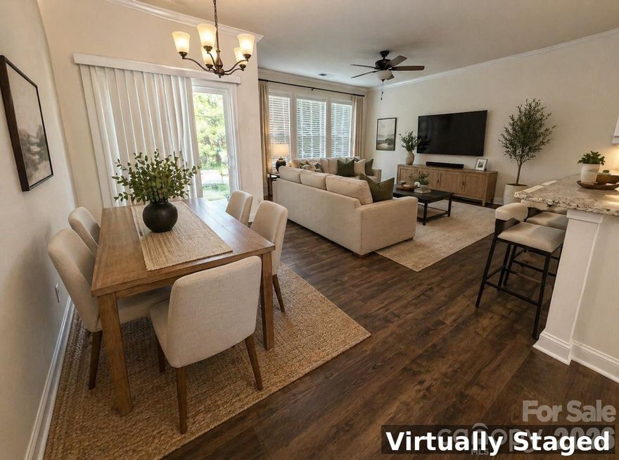 This upscale Lake Wylie townhome features an open floor plan, with luxury vinyl plank flooring throughout the main living area. A perfect chef's kitchen includes gas range, granite countertops, SS appliances, subway tile backsplash, pantry, & large island w/ breakfast bar. Travel upstairs and fall in love w/ the oversized primary suite w/ walk-in closet, along with the large seamless shower & dual vanities. This popular split-Bd floorplan has two additional spacious bedrooms on the opposite side of the upper level with a laundry room located in the middle for convenience. Maintenance free living at its best, w/ waste collection, pest control, irrigation, & landscaping included in the HOA dues. Private backyard with fire pit. Minutes from Lake Wylie, and everything that lake life has to offer. Low SC Taxes, Award-Winning School District and close proximity to Charlotte. Enjoy the many community amenities to include: Outdoor pool, Clubhouse, Picnic/Grilling area, Playground, Gym, Bocce ball & Pickleball Courts.This home has been virtually staged