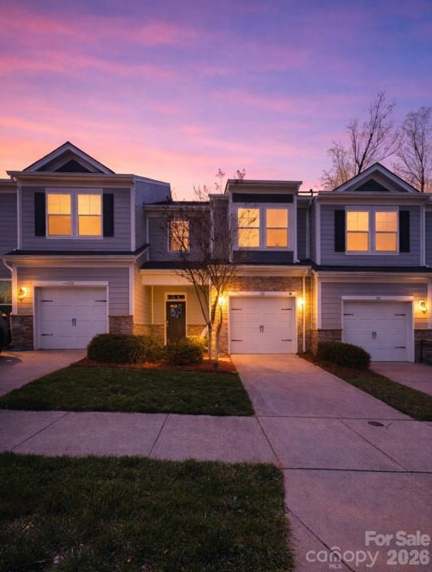 This upscale Lake Wylie townhome features an open floor plan, with luxury vinyl plank flooring throughout the main living area. A perfect chef's kitchen includes gas range, granite countertops, SS appliances, subway tile backsplash, pantry, & large island w/ breakfast bar. Travel upstairs and fall in love w/ the oversized primary suite w/ walk-in closet, along with the large seamless shower & dual vanities. This popular split-Bd floorplan has two additional spacious bedrooms on the opposite side of the upper level with a laundry room located in the middle for convenience. Maintenance free living at its best, w/ waste collection, pest control, irrigation, & landscaping included in the HOA dues. Private backyard with fire pit. Minutes from Lake Wylie, and everything that lake life has to offer. Low SC Taxes, Award-Winning School District and close proximity to Charlotte. Enjoy the many community amenities to include: Outdoor pool, Clubhouse, Picnic/Grilling area, Playground, Gym, Bocce ball & Pickleball Courts.