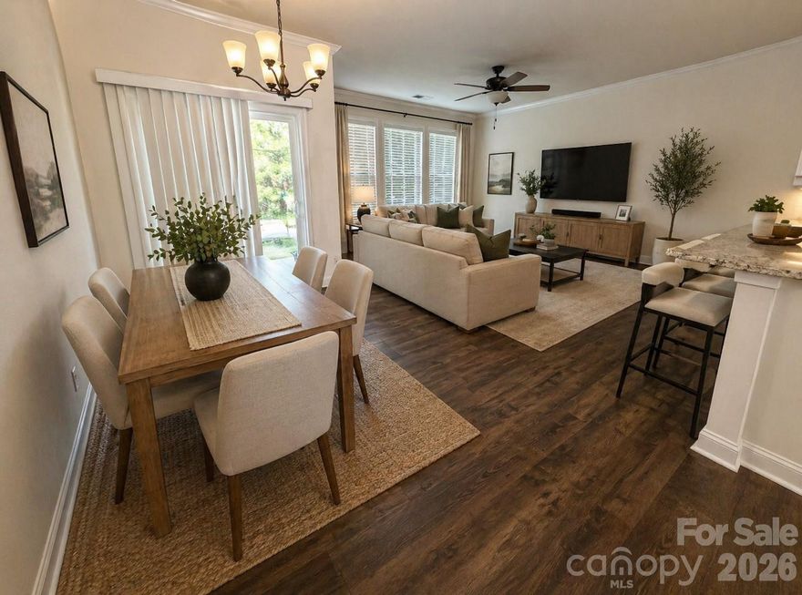 This upscale Lake Wylie townhome features an open floor plan, with luxury vinyl plank flooring throughout the main living area. A perfect chef's kitchen includes gas range, granite countertops, SS appliances, subway tile backsplash, pantry, & large island w/ breakfast bar. Travel upstairs and fall in love w/ the oversized primary suite w/ walk-in closet, along with the large seamless shower & dual vanities. This popular split-Bd floorplan has two additional spacious bedrooms on the opposite side of the upper level with a laundry room located in the middle for convenience. Maintenance free living at its best, w/ waste collection, pest control, irrigation, & landscaping included in the HOA dues. Private backyard with fire pit. Minutes from Lake Wylie, and everything that lake life has to offer. Low SC Taxes, Award-Winning School District and close proximity to Charlotte. Enjoy the many community amenities to include: Outdoor pool, Clubhouse, Picnic/Grilling area, Playground, Gym, Bocce ball & Pickleball Courts.This home has been virtually staged