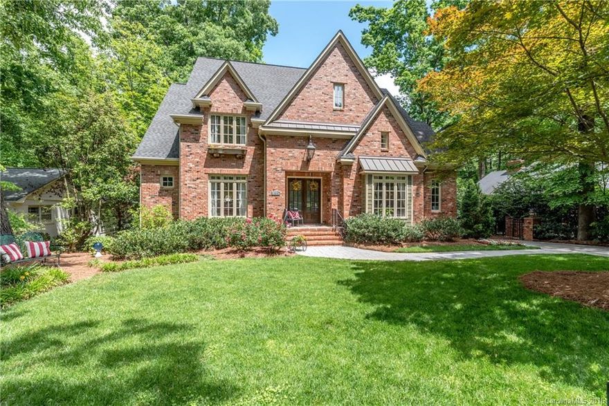 Spectacular Home w/wooded private rear yard Heavy molding & trim, hardwoods, 10ft ceiling & 8ft doors on main (9ft upstairs)both Kitchens & all baths has custom cabinets & granite Huge master suite & bath on main   Great Finished basement w9ft ceilings & windows in every room except exercise room Can be used for 2nd resident, man cave or just for entertaining Amazing outdoor space w/covered patio & fireplace. Oversized garage. Big enough for 3rd car lift. Hidden neighborhood w/lots of ways out.