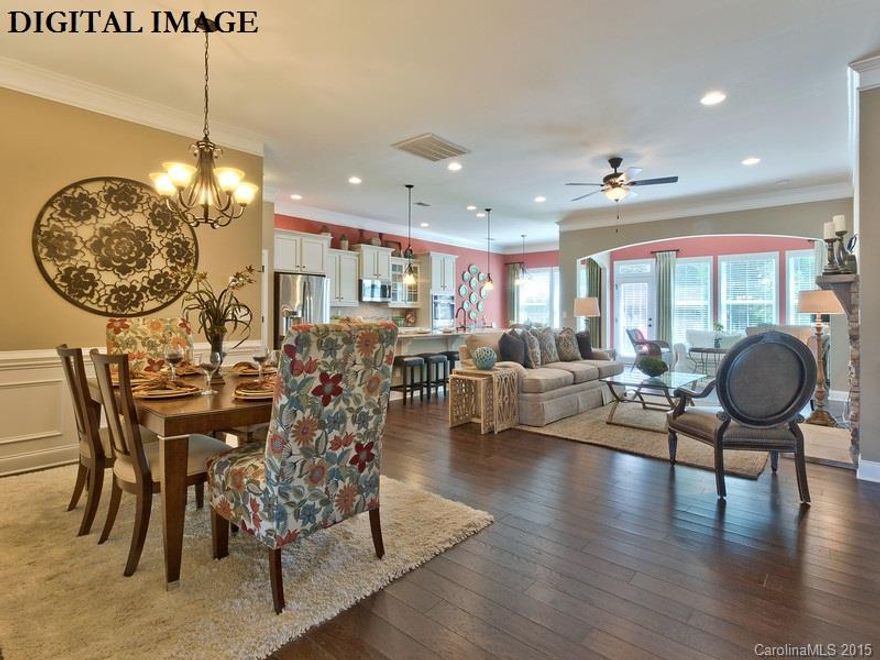 CHARMING RANCH HOME WITH TONS OF ELEGANCE! 4 BEDROOMS AND 3 FULL BATH MAKES THIS RANCH HOME A DREAM. FIREPLACE, HARDWOODS, GRANITE AND TILE MAKES THIS HOME LOADED WITH UPGRADES! CORNER HOMESITE WITH A PRIVACY BERM IN THE REAR.