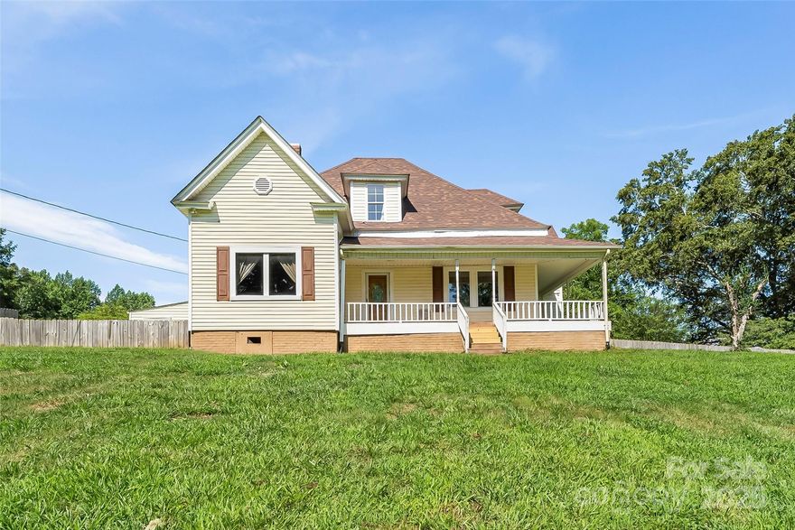 Discover comfort and character in this spacious 4-bedroom home nestled within the desirable Lenoir City Limits. Boasting over 2,000 square feet of comfortable living space, this property perfectly blends classic charm and modern convenience. The main level features two generously sized bedrooms, including one with a cozy wood-burning fireplace. The large kitchen and dining area is a true heart-of-the-home space, complete with a gas log fireplace. Upstairs, you'll find two additional bedrooms and abundant storage, offering flexibility for guests, office space, or a growing household. Step outside to enjoy the fenced-in yard—great for pets, kids, or gardening—and unwind on the wraparound porch, perfect for morning coffee or evening chats. Conveniently close to downtown Lenoir, this home offers the best of comfort and location. New roof was put on in 2023!