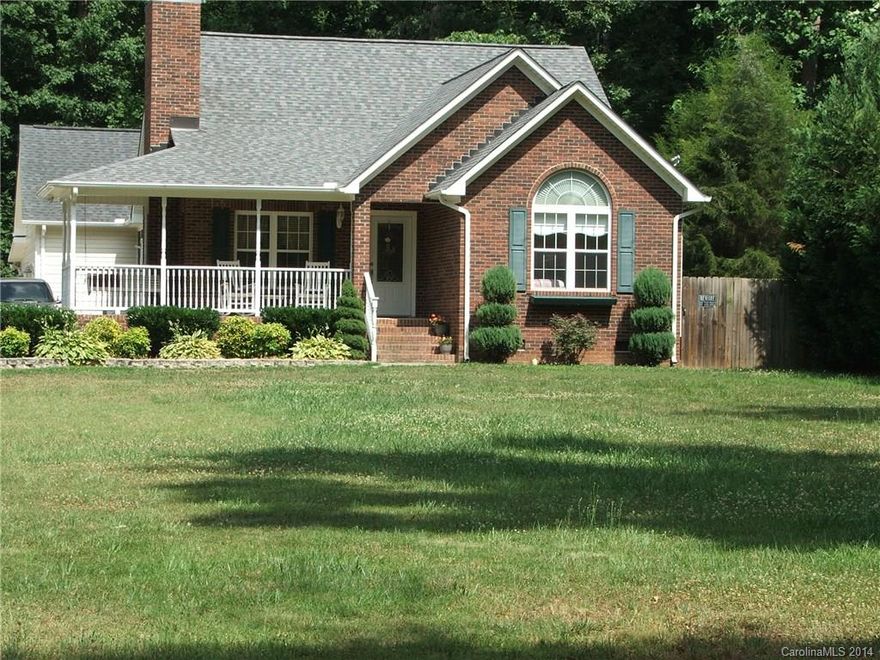 Beautiful home in the country, with 3 car garage! House has volume ceilings and custom features throughout. Tons of living space outside, including screened porch, deck and patio. This house has way to many features to list, a must see for any car buff or one wanting a country living.