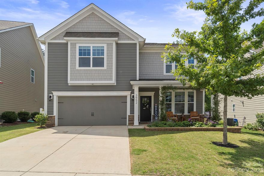 Exactly what you've been looking for! This 5-bedroom 3.5 bathroom stunner is nestled on a quiet cul-de-sac street in the desirable Bridgewater community of Sherrills Ford. You will not find a more pristine home inside and out!  Excellent for entertaining, this home is flooded with natural light and open spaces. With nearly 3,000 well allocated square feet, each room has the perfect blend of form and function. Kitchen features large island, granite counters, 42" cabinets, large pantry, and stainless appliances. Primary suite on main level overlooks gorgeous backyard garden, and hosts large en-suite with soaking tub, shower, water closet, and dual vanity. Upstairs you'll find 4 additional large bedrooms, two full bathrooms and massive loft space. On one of the best lots in the neighborhood, sellers have created a natural backyard oasis, complete with outdoor kitchen, covered patio, fire pit, retaining wall and new sod! Checks every box! Schedule your tour before it's too late!